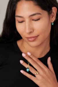 Scarab Turquoise and Black Enamel Pendant on figure